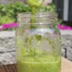 Salsa verde poured into jar