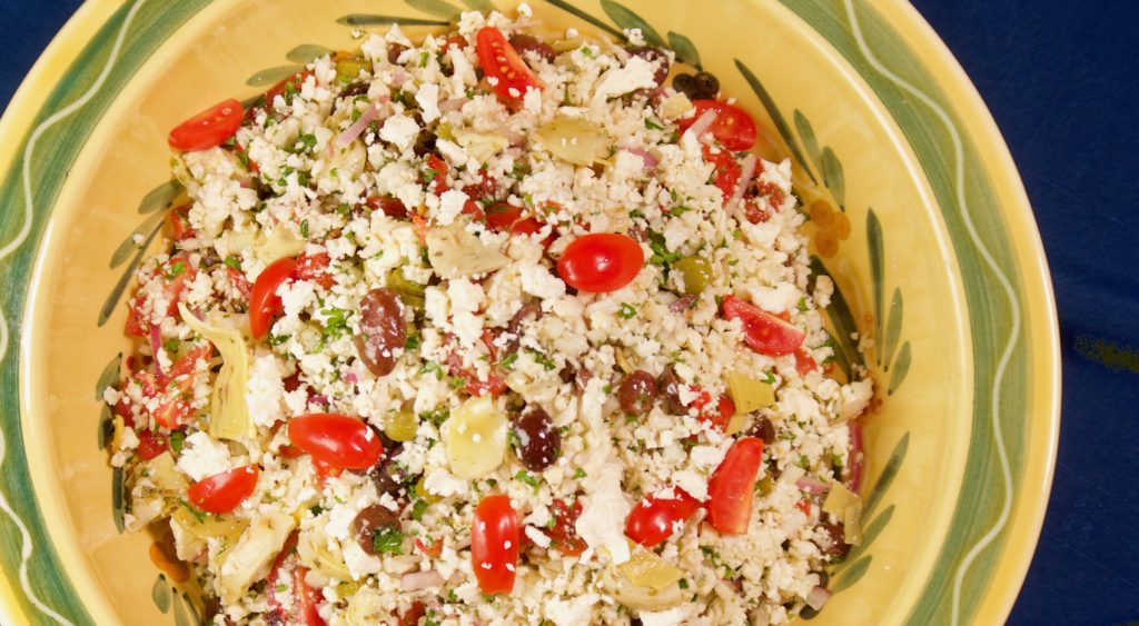 Riced cauliflower, Cherry Tomato,Artichoke, Gherkins, Olives and Parsley