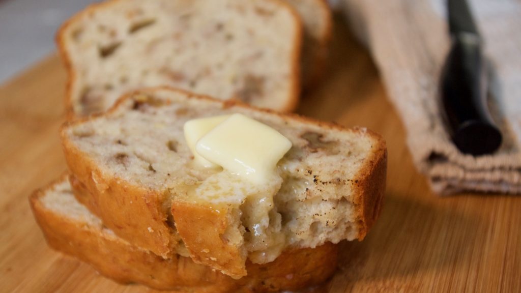 Banana Bread slices with melting Butter.