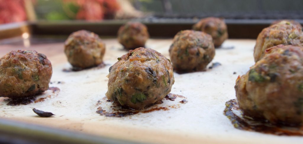 Freshly cooked Moroccan Meatballs on sheet pan