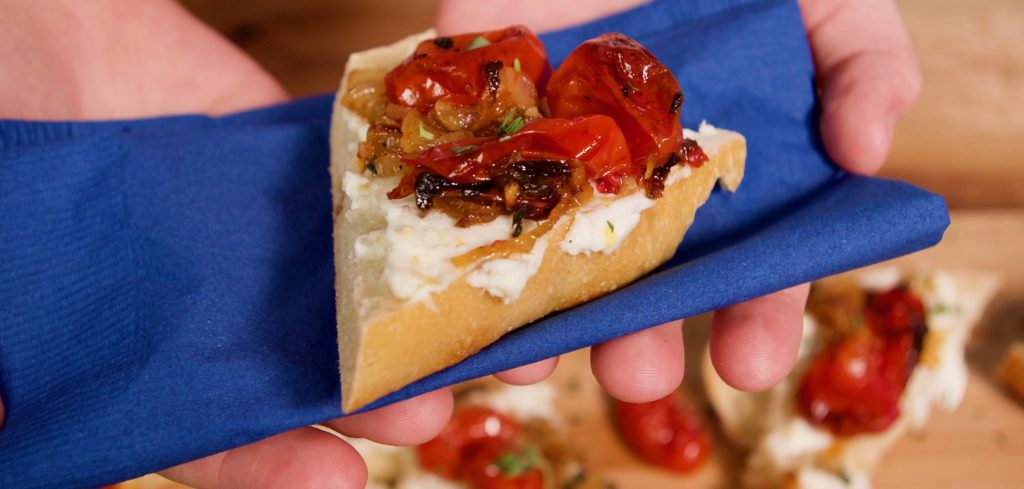 Napkin holding a Roasted Tomato Bruschetta