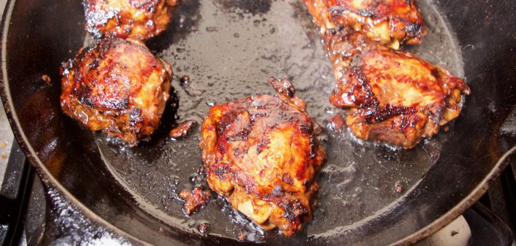 Chicken Thighs browning in pan