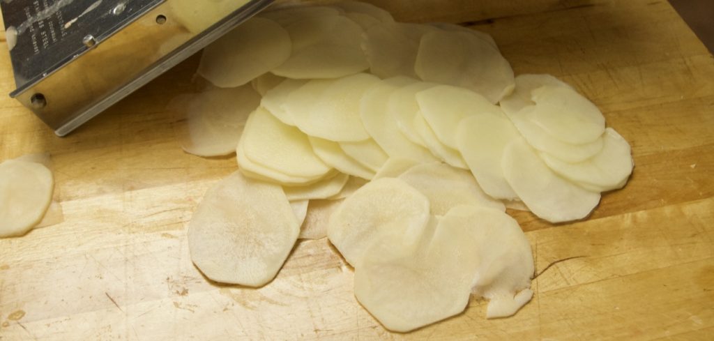 Potatoes cut on mandolin